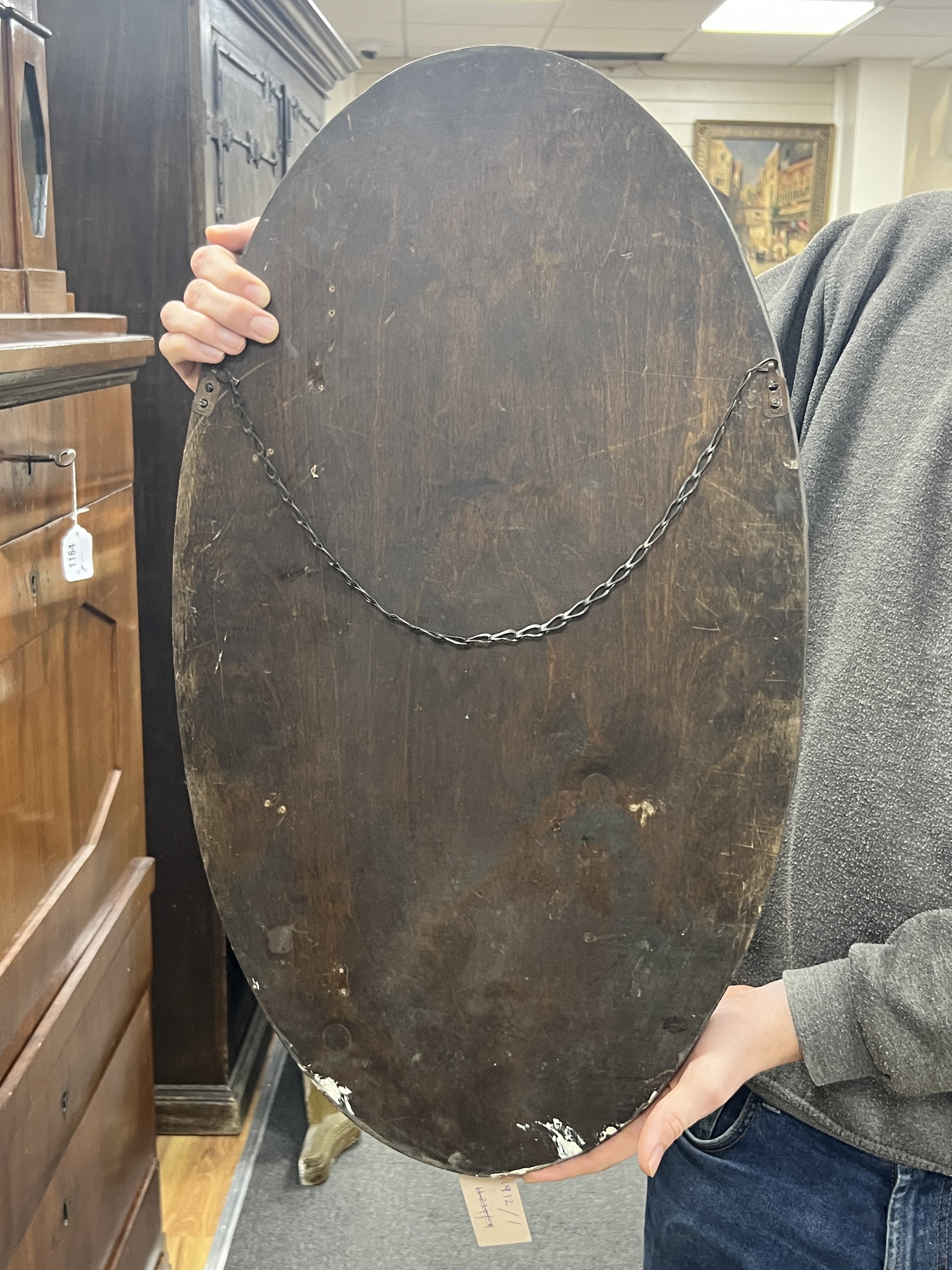 An Irish style oval wall mirror, width 38cm, height 66cm